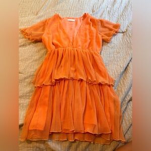 Orange ruffle tiered mini dress